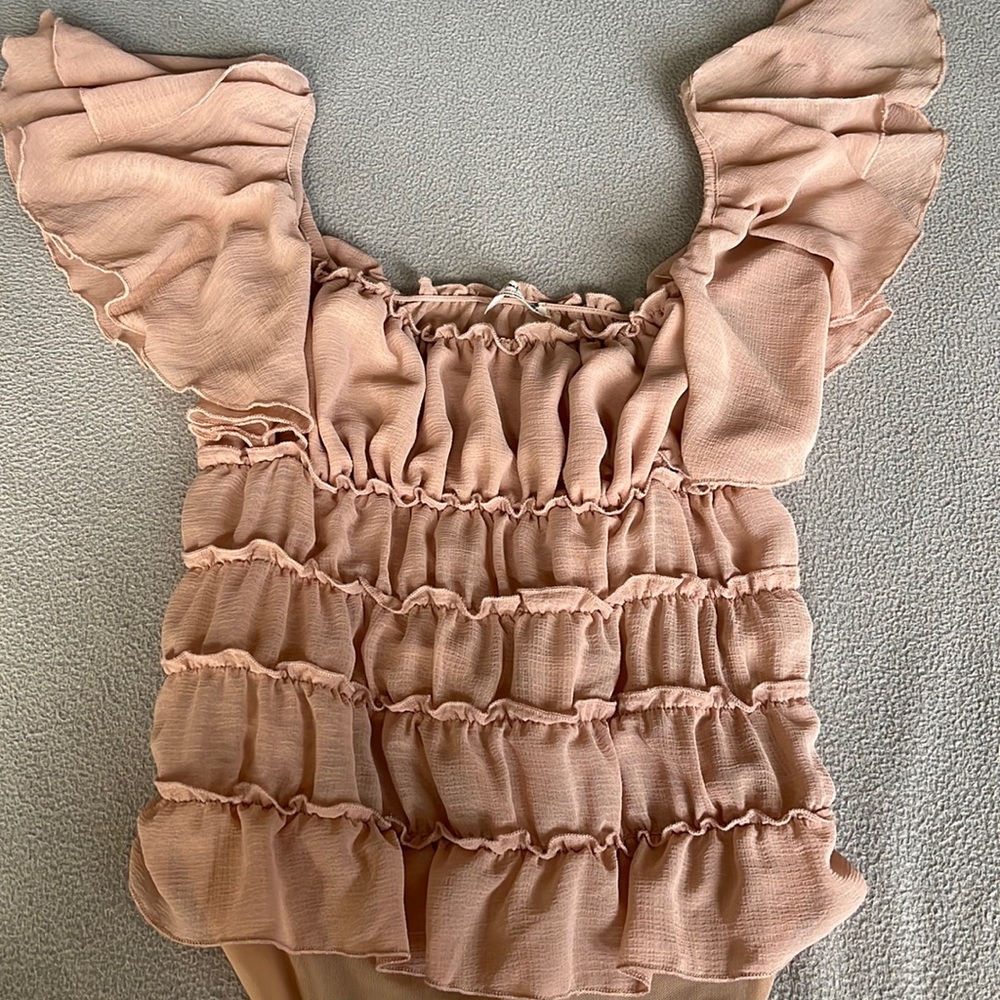 Pink Free people ruffle bodysuit